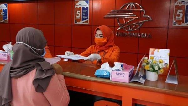 Pos Indonesia Dimasa PPKM, Kembali Bayarkan Bansos Tunai
